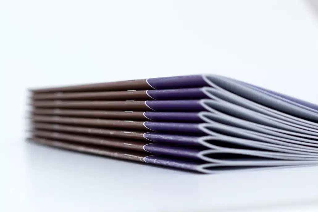 Stack of stapled brochures