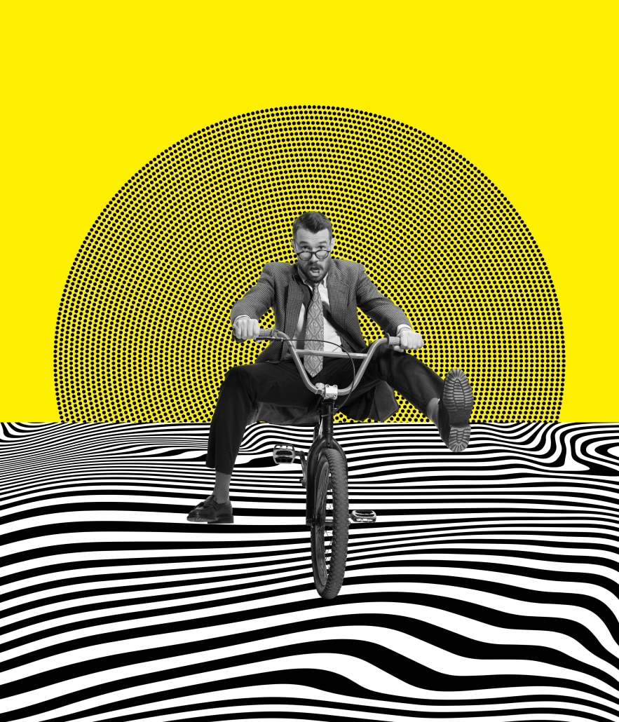 Entrepreneur on a bicycle in a black and white landscape