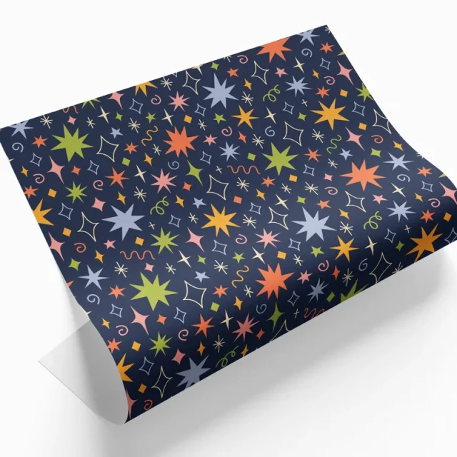 Example of a printed wrapping-paper sheet with a colourful star pattern
